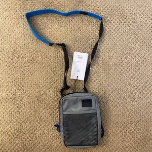 Hershel delta shoulder bag